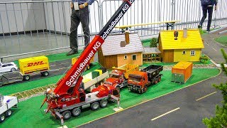 HYDRAULIC RC MODEL TRUCK CRANE SCHMIDBAUER KG AT WORK ON RC CONSTRUCTION SITE [upl. by Kilk]