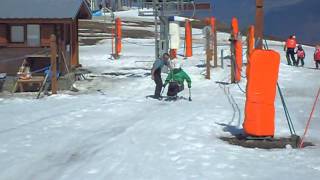 Adaptive skiing  getting on a drag lift in monoski demo [upl. by Aryahay]