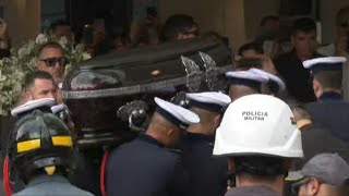 Brazilian football great Peles coffin arrives at cemetery  AFP [upl. by Heiskell436]