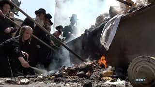 UltraOrthodox Jews burn leavened bread in Jerusalem ahead of Passover [upl. by Htebiram]