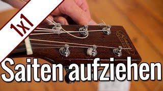 Gitarrensaiten aufziehen  Gitarren 1x1 [upl. by Gerrie]