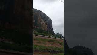 a spectacular view of this large natural inselberg nature nigeriatourism rockformation tour [upl. by Ahsilahs]