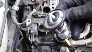 How to replace thermostat Toyota Camry 22 liter engine Years 1991 to 2002 [upl. by Connolly]