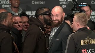 FACEOFF Deontay Wilder and Tyson Fury push each other and thrown off stage [upl. by Shelia495]