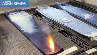 Uniqlo uses lasers to make distressed denim jeans to cut water consumption [upl. by Nnylecoj]