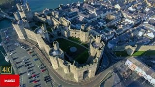 Caernarfon Castle Breathtaking Aerial View [upl. by Halet249]