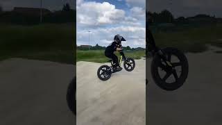 Revvi 16 vs Stacyc Electric Balance Bikes race at BMX track best E bikes for kids [upl. by Dimah707]