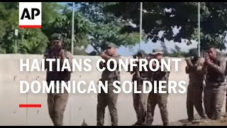 Haitians confront Dominican soldier at the border [upl. by Ylrebmek675]