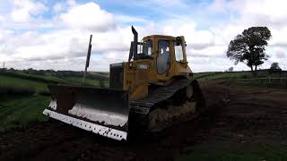 Caterpillar D4H pushing topsoil [upl. by Lach]