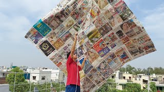 Making And Flying Worlds Biggest Newspapers Kite [upl. by Arocat]