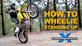 How to wheelie standing up on a dirt bike︱Cross Training Enduro [upl. by Revilo]