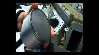 How to install Outboard Pistons when rebuilding your outboards motor [upl. by Hindu]