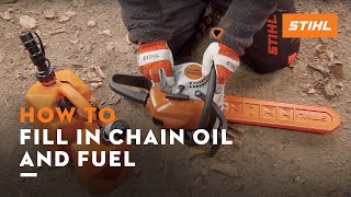 Filling a STIHL chainsaw with fuel and chain oil [upl. by Feil]