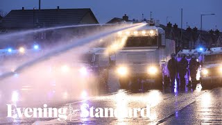 Police blast rioters with water cannon as violence flares again in Northern Ireland [upl. by Hannad134]