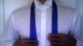 How to tie a tie  Quick and Easy [upl. by Ohploda]