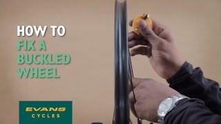 How to fix a buckled wheel [upl. by Preiser]