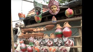 Colorful Durga face idols being sold at a potter shop in Bihar [upl. by Hourihan]