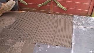 Laying slate on a solid concrete base using adhesive [upl. by Attiuqram]