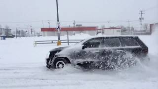 Jeep SRT8 VERY DEEP SNOW Parking Lot Fun [upl. by Ecnerrot804]