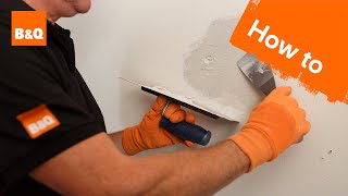 How to patch plaster a wall [upl. by Drawoh895]