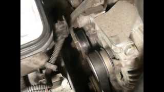 How to Remove the Serpentine Belt on a Saturn L200 [upl. by Arymahs294]