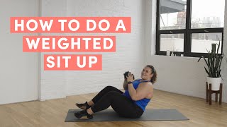 How to do a Weighted Sit Up  The Right Way  WellGood [upl. by Keily10]