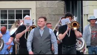 Kirkby Lonsdale Bands in competition march down street [upl. by Nyrahtak]