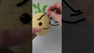 Embroidering eyebrows on my amigurumi pineapple amigurumi freecrochetpattern [upl. by Steffi]