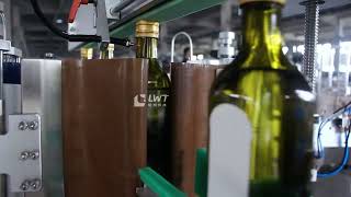 Doublesided labeling machine 500ML glass bottle oil complete version [upl. by Malinowski132]