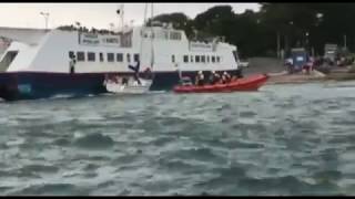 Tide pins yacht against side of Sandbanks Ferry [upl. by Nennerb]