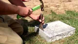 How to chisel a Nicolock Granite City Blend Retaining Wall Cap Ryans Landscaping [upl. by Endo299]