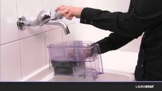 Laurastar  How to fill the water filter with antiscale granules [upl. by Eelah]