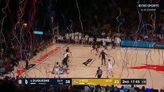 confetti falls on the court in the middle of Duquesne vs VCU game [upl. by Atenek]