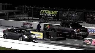 Tuned CTSV vs Supercharged TRD Tundra  14 Mile Drag Race Video  Road Test TV ® [upl. by Pinelli107]