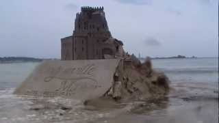 sand castle destruction by second highest tide in the world httpnontoxicattitudecom [upl. by Garlan]