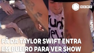 Fã da cantora Taylor Swift entra em bueiro para assistir show [upl. by Daly]