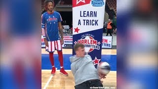 Harlem Globetrotter gets SCHOOLED by a basketball freestyler [upl. by Oinotla]