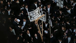 UltraOrthodox Jews protest against military conscription  AFP [upl. by Eidoow]