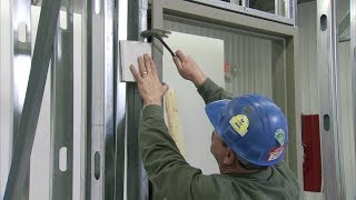 How to Install a Steel Door Frame in Steel Stud Construction  Steel Door Institute [upl. by Dielle]