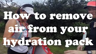 How to remove air from your bladder  hydration pack [upl. by Ivatts]