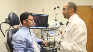 Laryngoscopy and stroboscope to examine the vocal cords [upl. by Daniels]