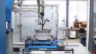 Production assembly of a tire rim using a robotic screwdriving machine [upl. by Katrine]