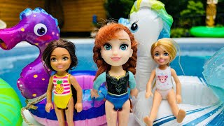 POOL  Elsa and Anna toddlers  Barbie  boat slide  floaties  swim  water fun  splash [upl. by Hephzibah28]