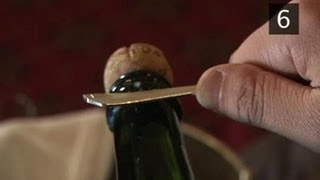 How To Pop Open A Champagne Bottle With A Spoon [upl. by Markiv]