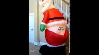 GEMMY ANIMATED AIRBLOWN INFLATABLE MOONING SANTA [upl. by Etnoid]