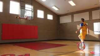 Basketball World Record Longest Basketball Bounce Shot Made While Riding a Unicycle [upl. by Nessi]