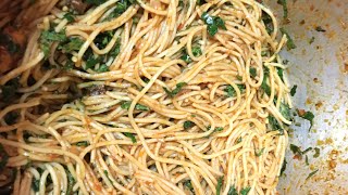 How to make jollof spaghettipasta with ugu leave for dinnerjollof spaghetti recipe [upl. by Ellene]