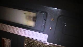 How To Change Replace Fix The Light Bulb On a Whirlpool Microwave Range [upl. by Attenra]