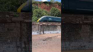 GWR class 800 skips across the top of coryton cove Paddington to Newquay800313 IET Hitachi train [upl. by Garreth]