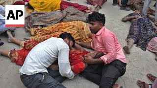 More than 100 dead in stampede at religious gathering in northern India officials say [upl. by Birdt]